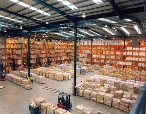 indoor warehouse storage facility packed with boxes