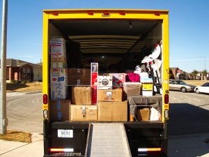 boxes packed in moving truck outside